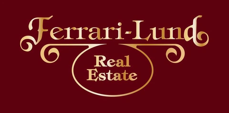 A red and gold logo for ferrari-lusso real estate.